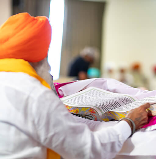 Sikh man reading